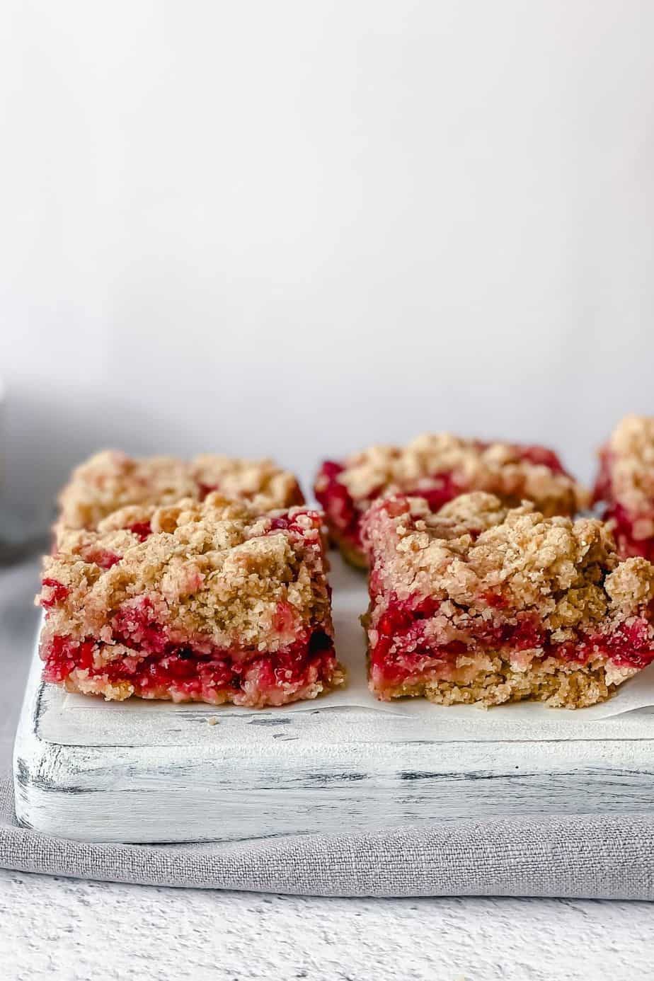 These Red Currant Crumble Bars are gluten free, super easy summer berry recipe that you can whip up in only few minutes. Serve them for dessert, breakfast or enjoy as a delicious snack during the day. - The Yummy Bowl