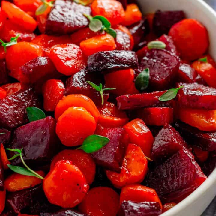 a bowl of roasted beets and carrots.