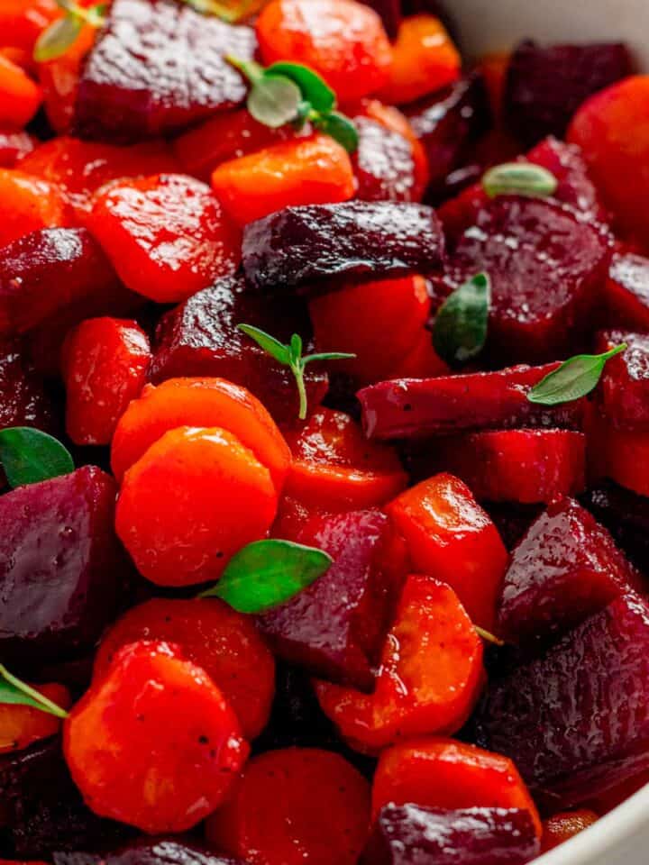 a bowl of roasted beets and carrots.
