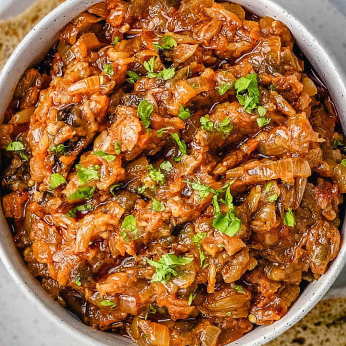 Terrific smoky eggplant caviar spread/dip! Perfect to spread over crackers for an easy, healthy, delicious appetizer. #eggplantcaviar #eggplantdip #eggplantcaviarrussian #eggplantspread #roastedeggplantspread #veganeggplantspread