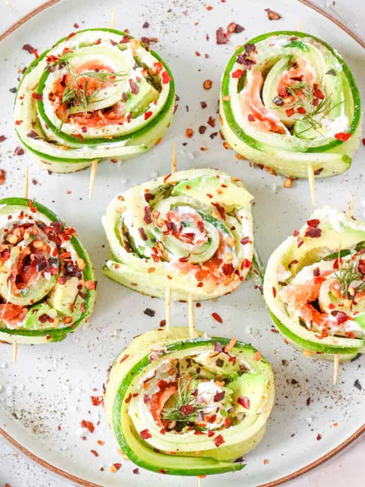 salmon cucumber rolls with sesame seeds.