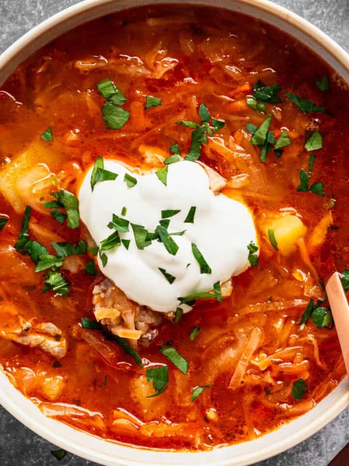 polish sauerkraut soup with meat in a bowl.