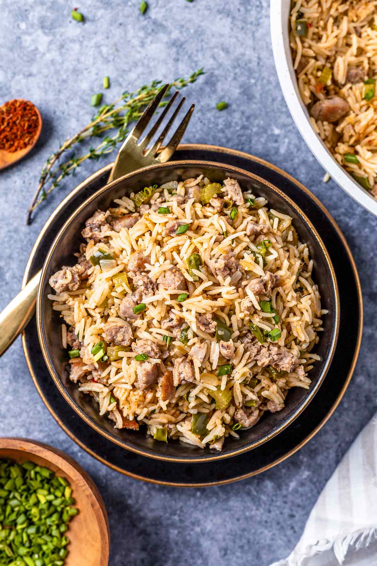 Sausage Dirty Rice in a black bowl