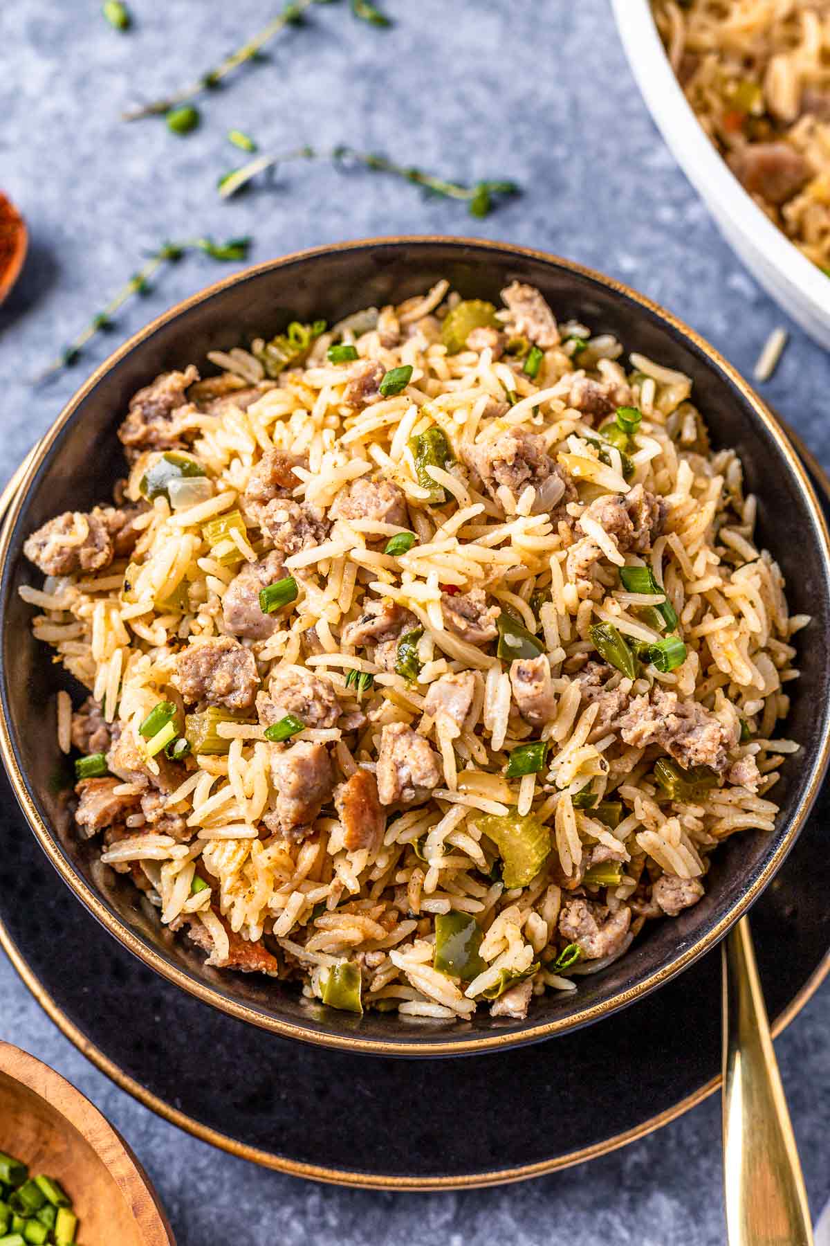 Sausage Dirty Rice in a black bowl