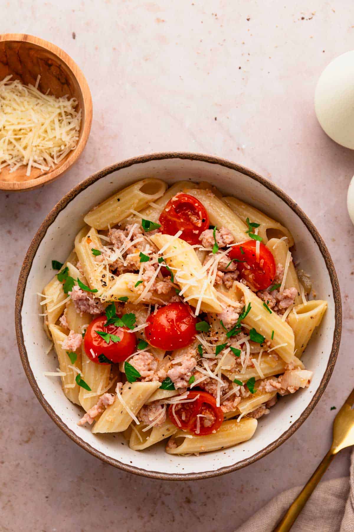 ground sausage pasta in a bowl.