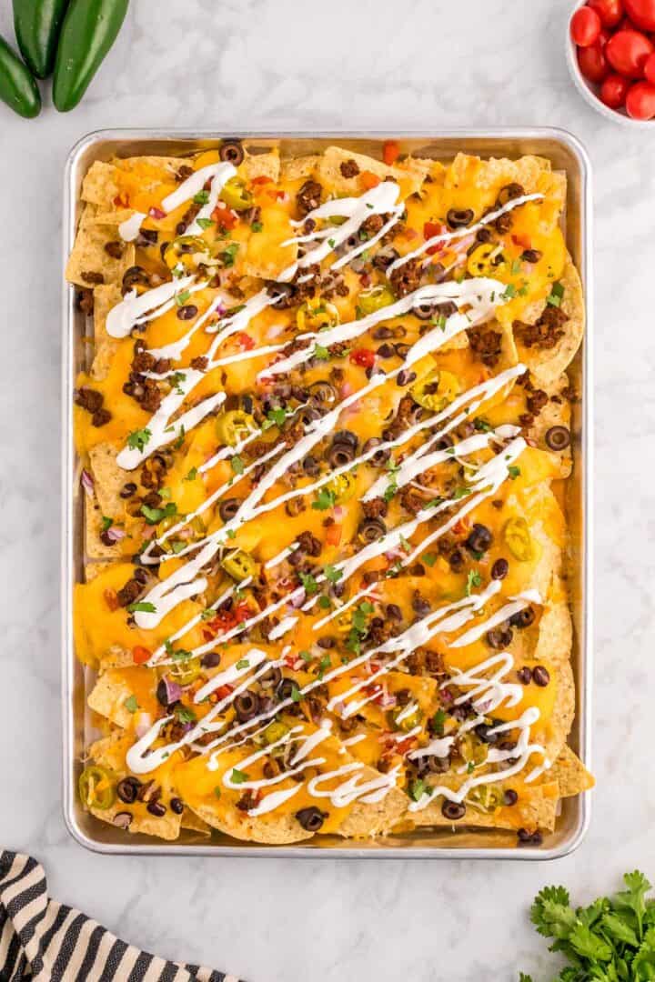 loaded cheesy taco meat sheet pan nachos.