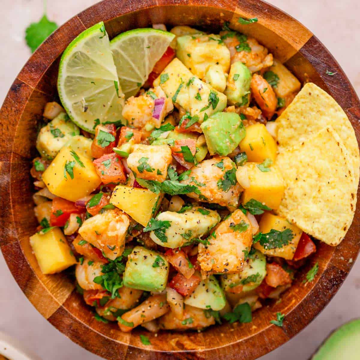 a bowl of mango shrimp salsa.