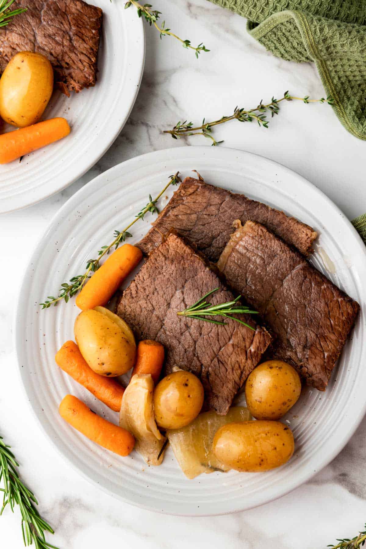 rump roast with vegetables on a plate