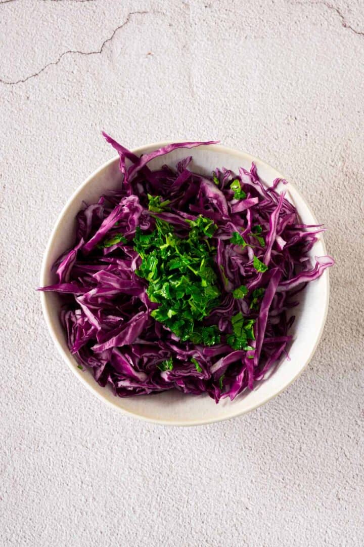 red cabbage sliced thin in a bowl.