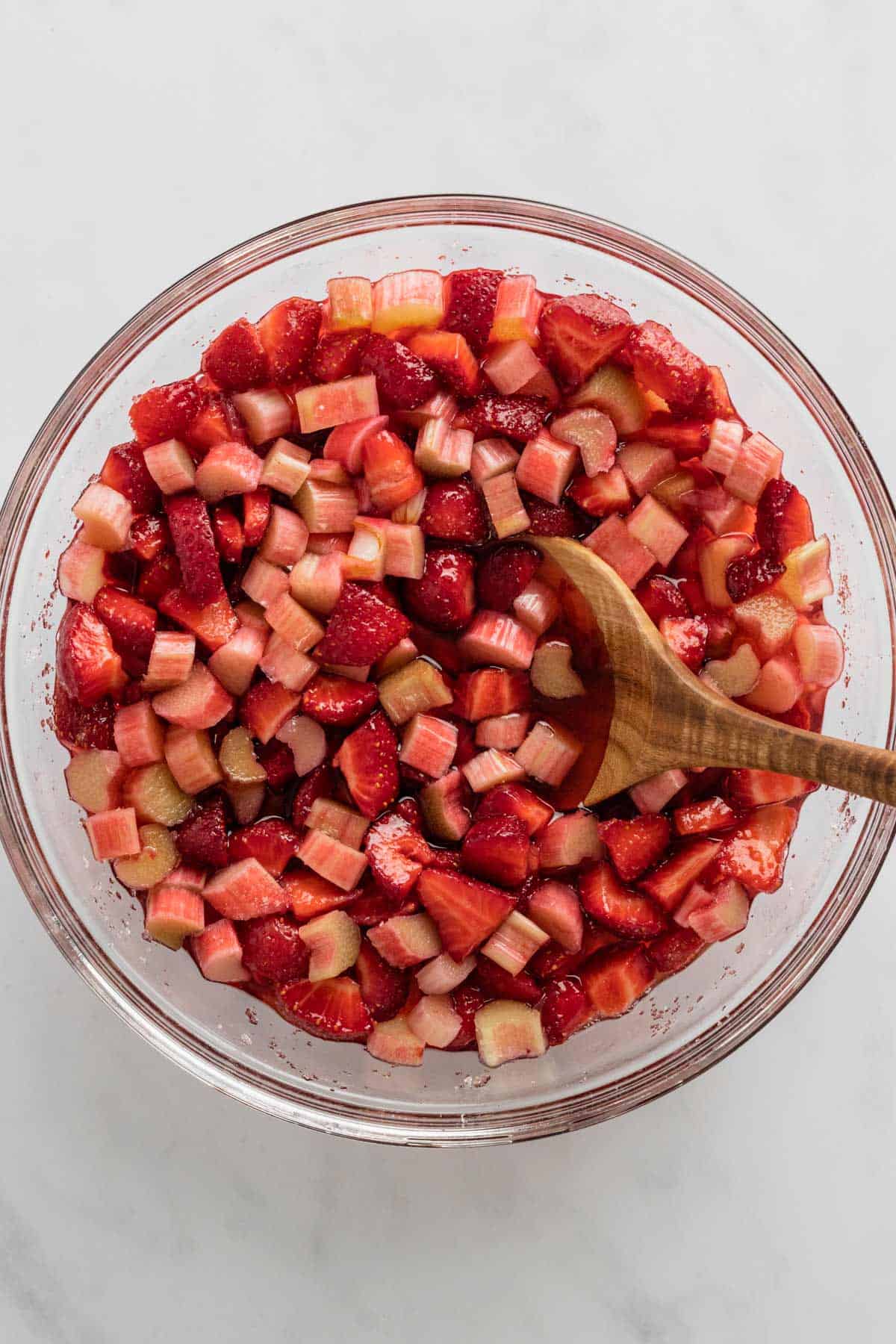 diced strawberries and rhubarb in mixing bowl