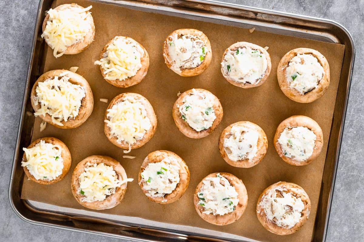 stuffed mushrooms with creamy filling before baking