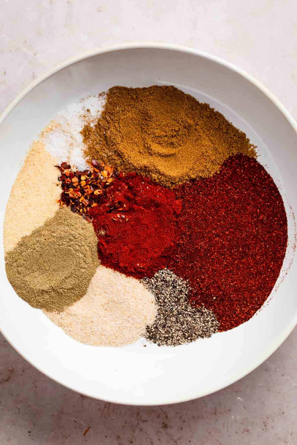 taco seasoning ingredients on a saucer