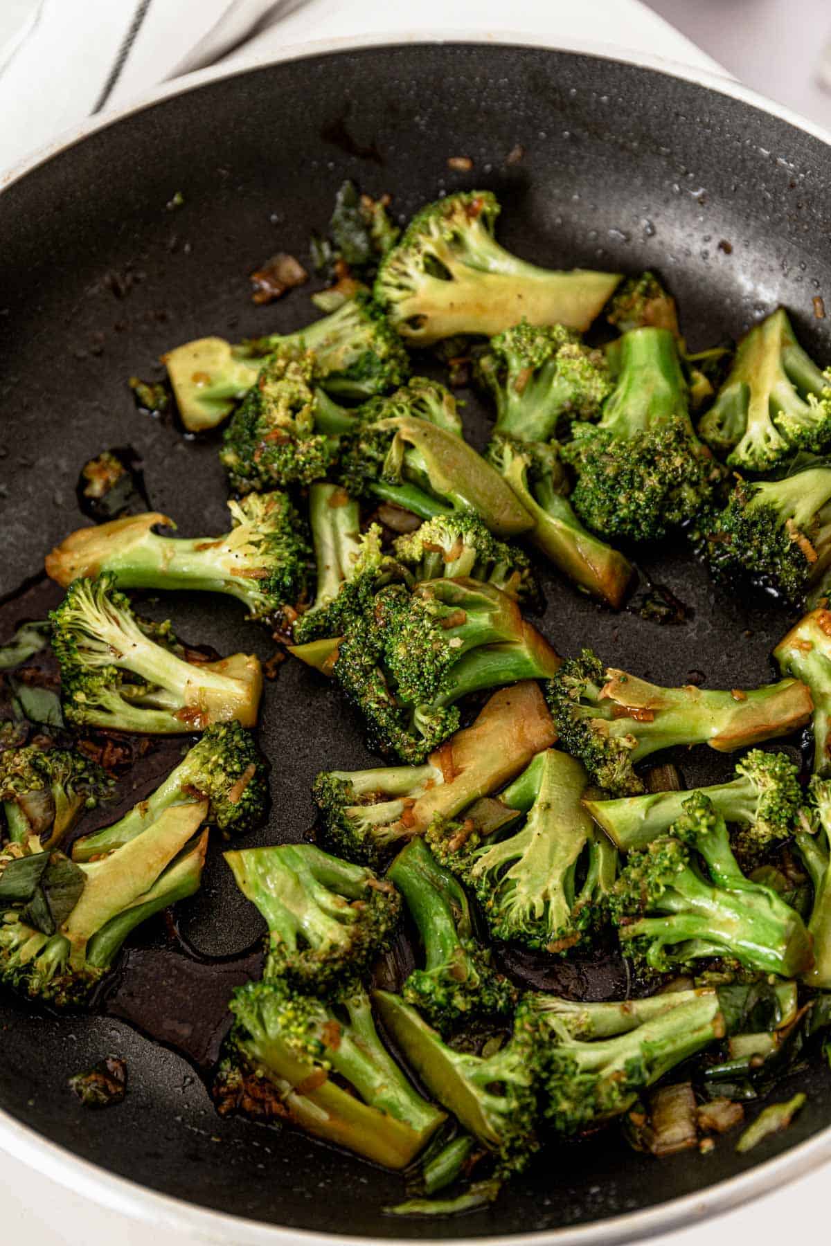 broccoli stir fried in a pan