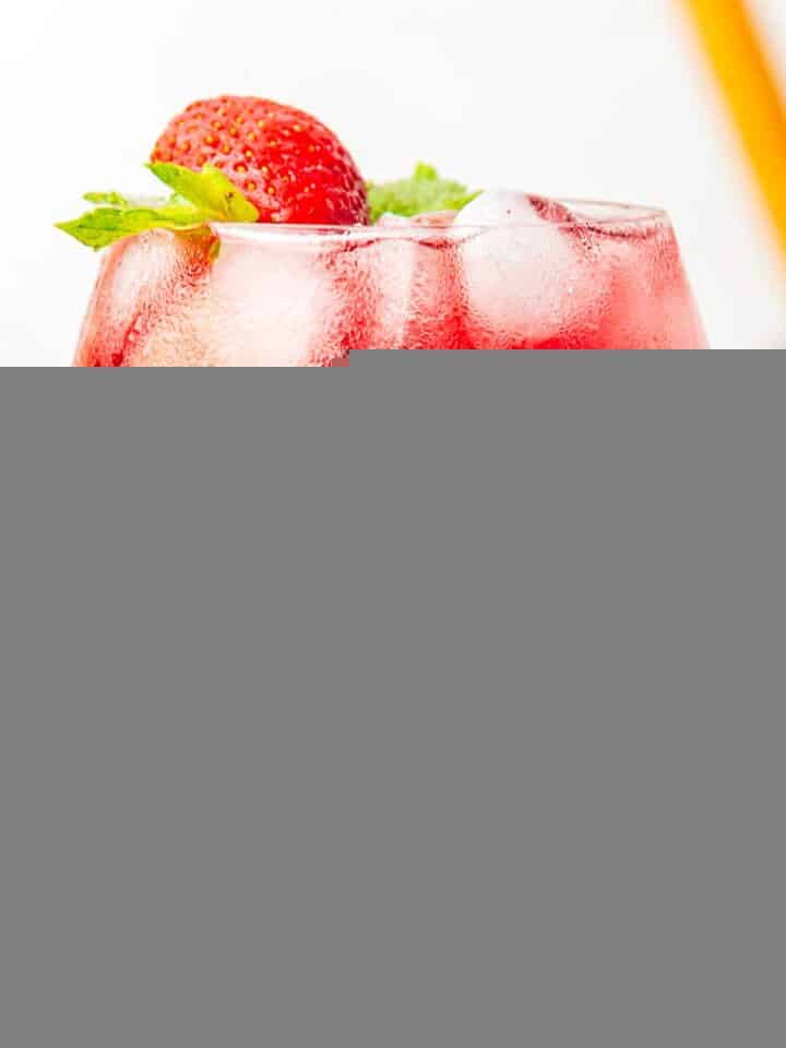 tinto de verano cocktail with strawberries and mint.