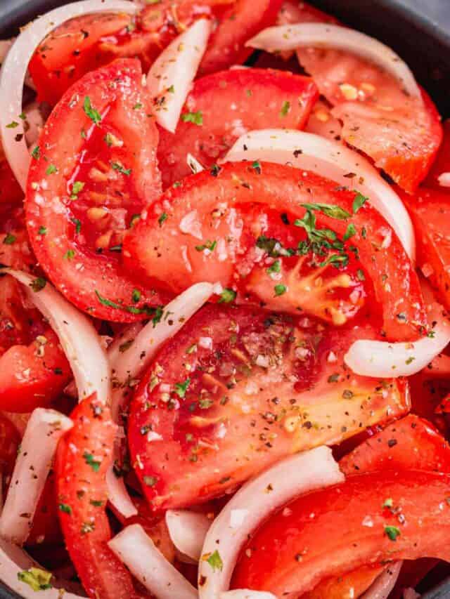 tomato salad with onions bowl.