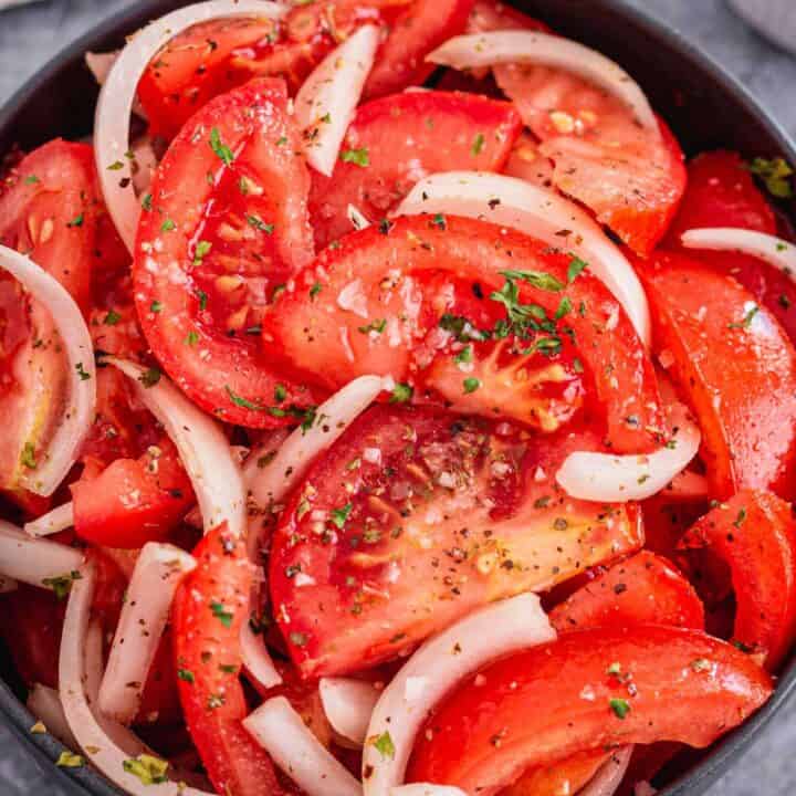 tomato salad with onions bowl.