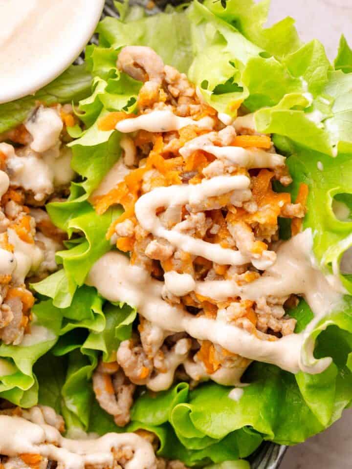 Ground turkey wraps with tahini sauce.
