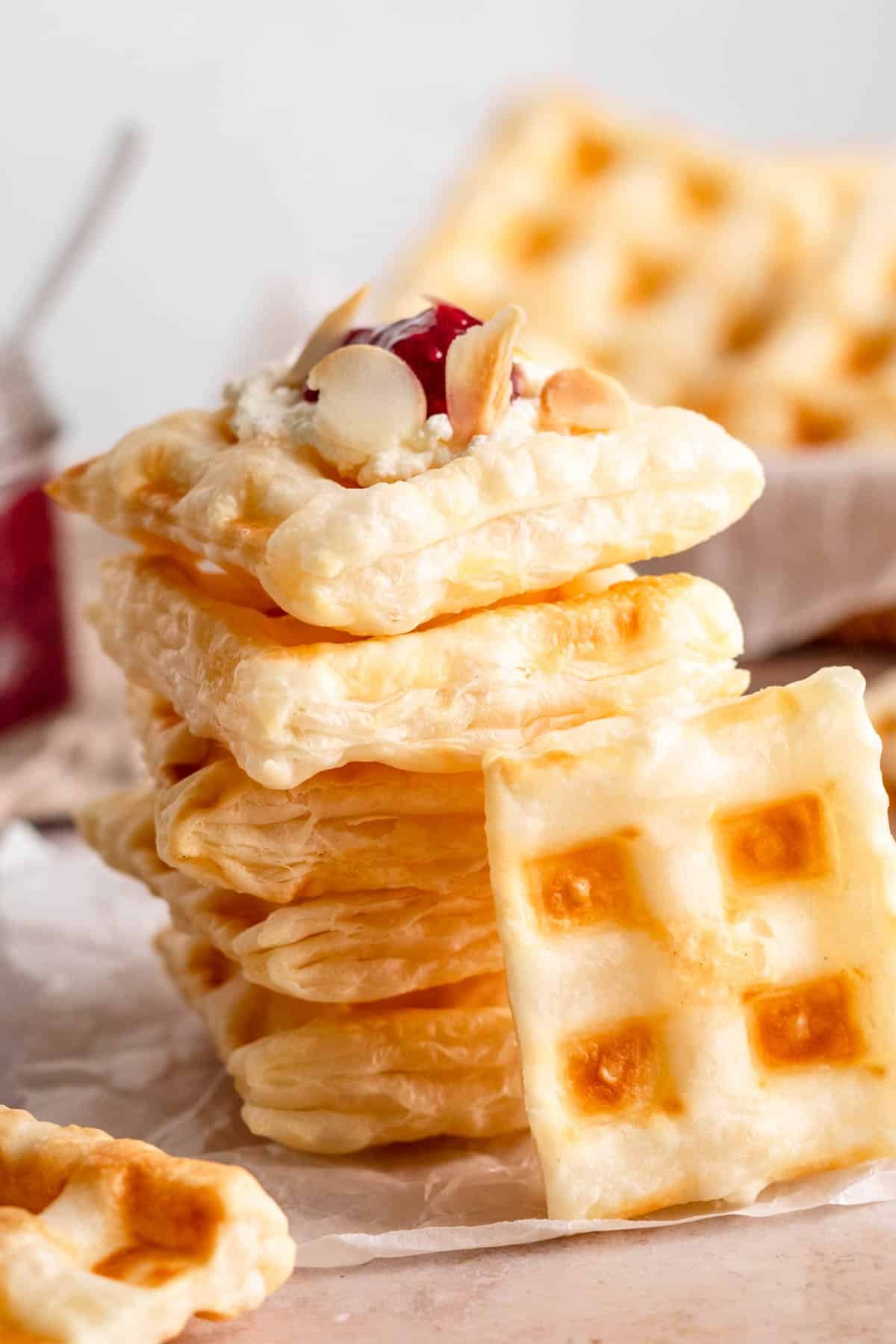 Puff pastry waffles with cream cheese and jam.