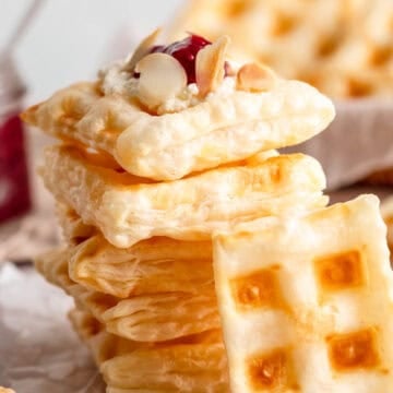 Puff pastry waffles with cream cheese and jam.