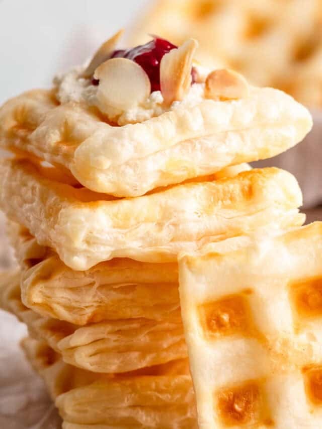 Puff pastry waffles with cream cheese and jam.