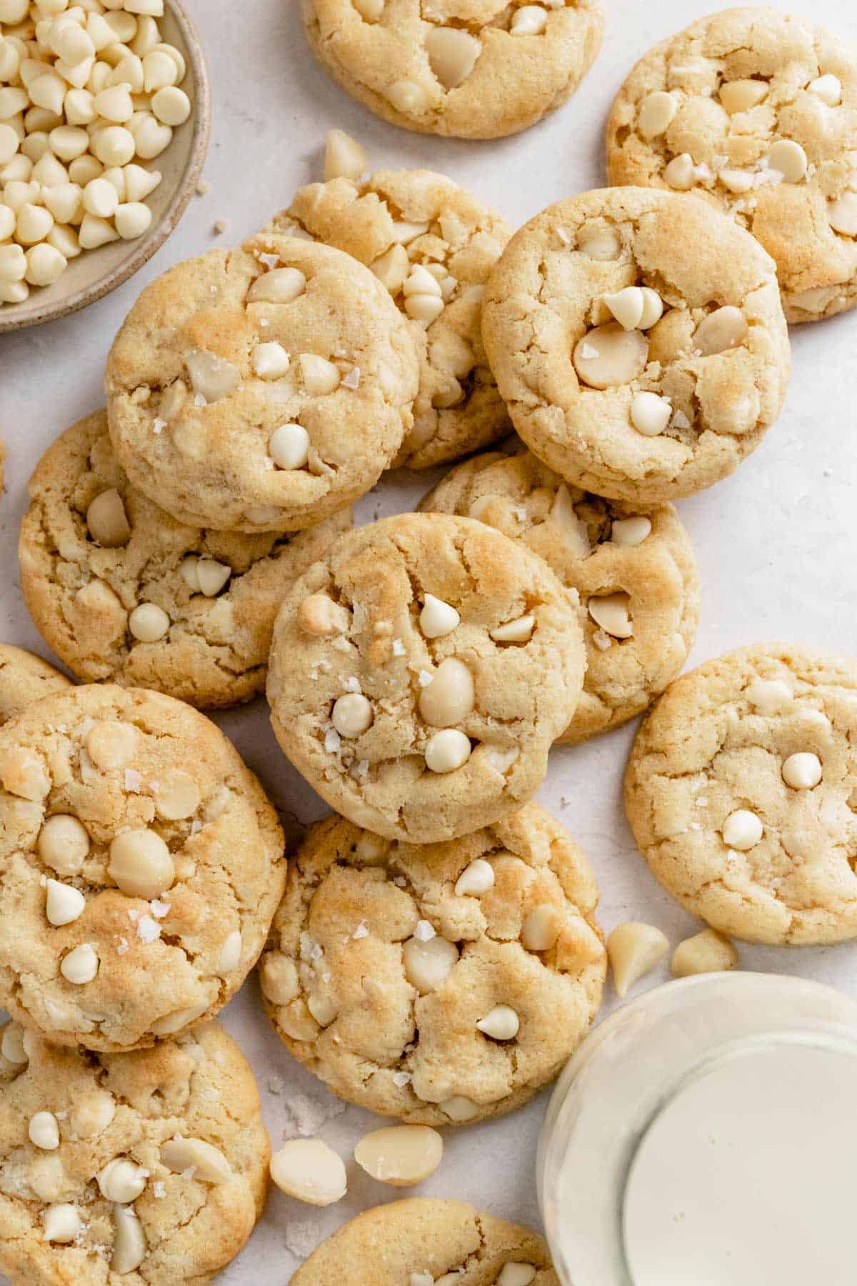 a stack of macadamia nut cookies with white chocolate chips