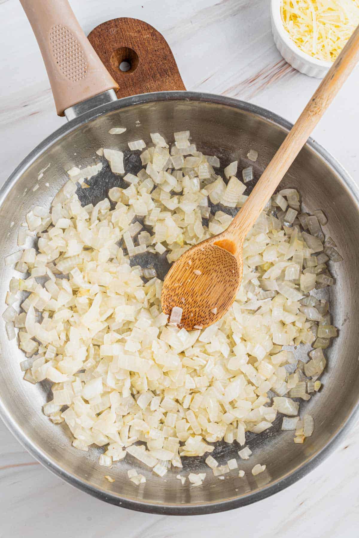 sauteing onion in skillet.