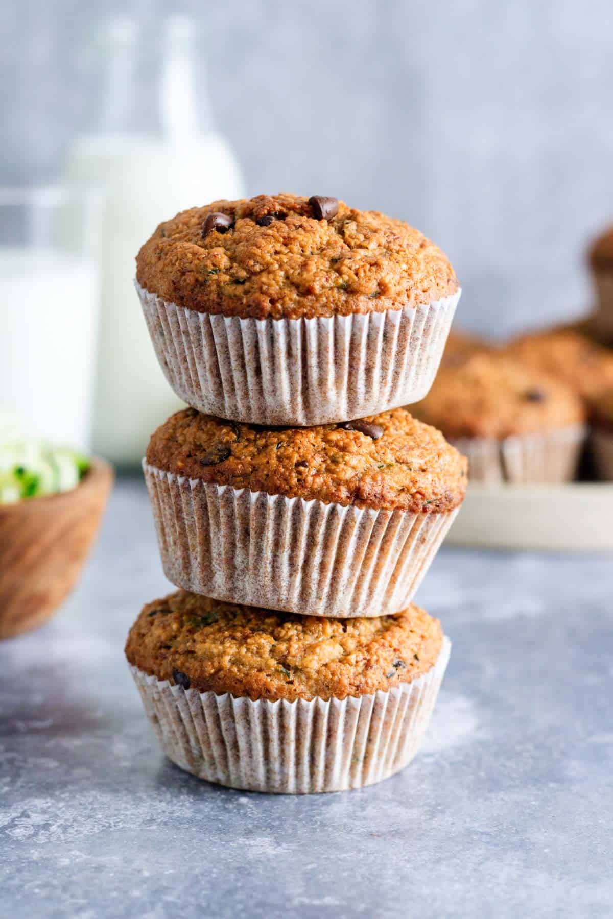 a stack of healthy zucchini muffins.